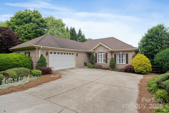 7471 Barfield Ln, Denver, NC 28037 - single story home with brick siding, a garage, and driveway