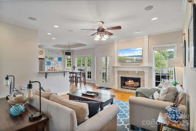 7471 Barfield Ln, Denver, NC 28037 - living room featuring plenty of natural light, ceiling fan, light wood-type flooring, recessed lighting, and a premium fireplace
