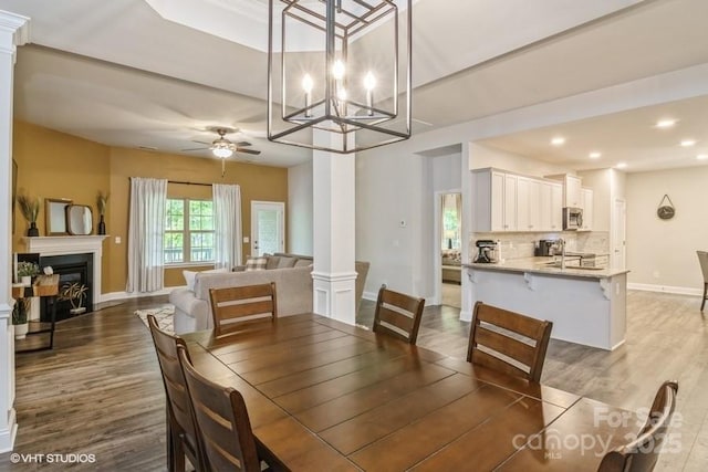 876 Hardin St Unit B24, Lancaster, SC 29720 - dining area with ornate columns, wood finished floors, baseboards, recessed lighting, and a ceiling fan