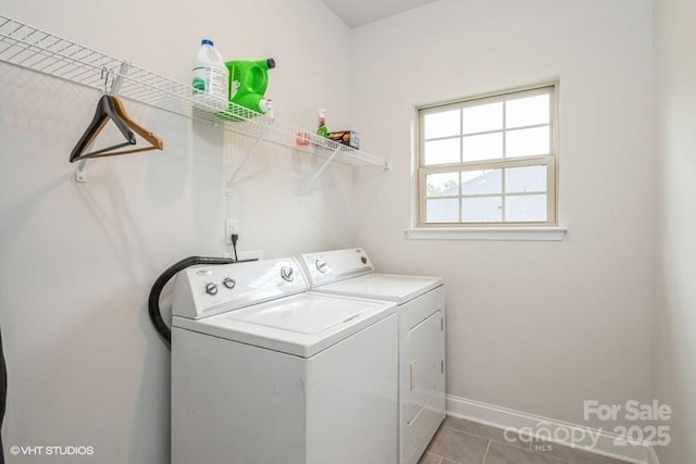 876 Hardin St Unit B24, Lancaster, SC 29720 - laundry room with washer and dryer, baseboards, and light tile patterned floors