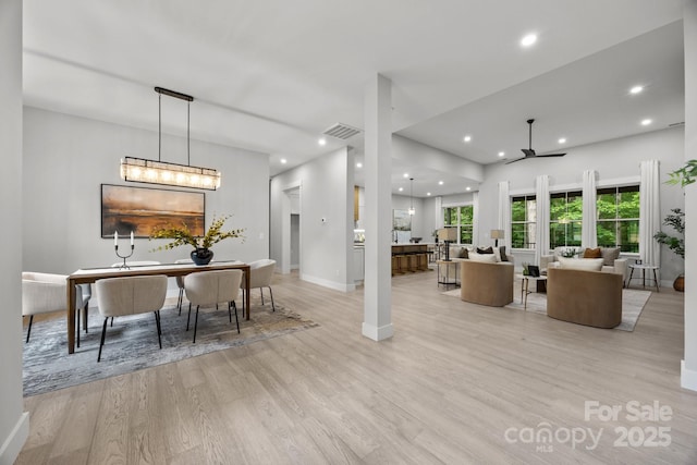 dining area featuring recessed lighting, a ceiling fan, visible vents, and light wood-type flooring