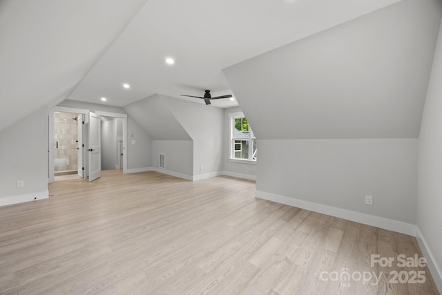 bonus room featuring lofted ceiling, recessed lighting, light wood finished floors, and baseboards