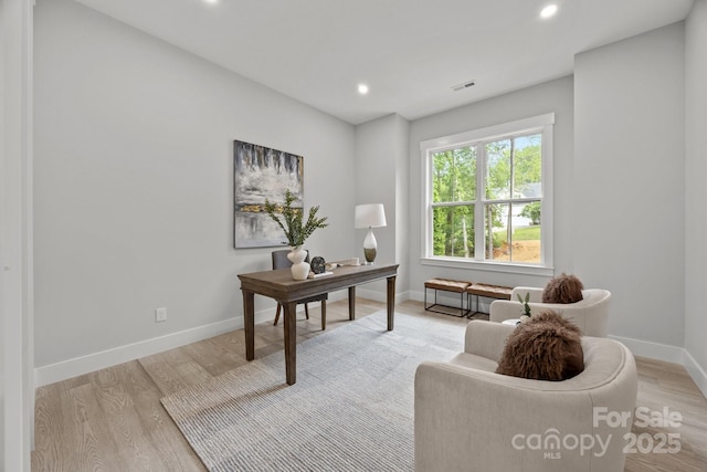 home office with baseboards, recessed lighting, and light wood-style floors