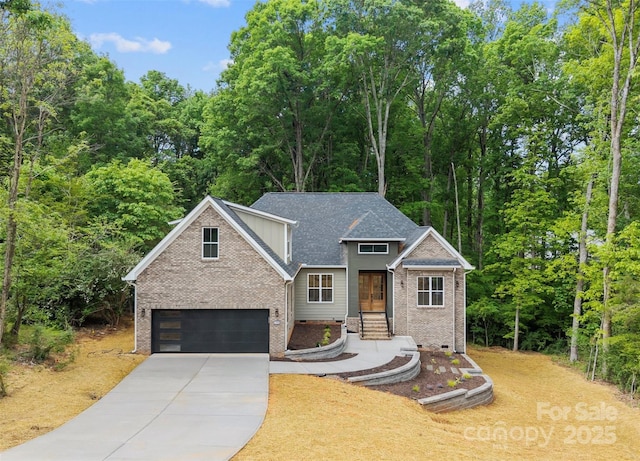 view of front of house with concrete driveway, brick siding, and a garage
