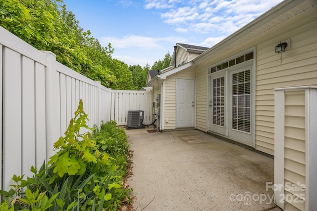 8313 Carob Tree Ln, Charlotte, NC 28215 - view of patio / terrace with central AC unit