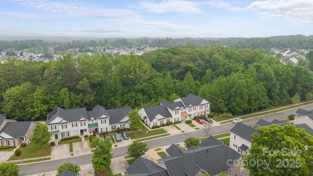 8313 Carob Tree Ln, Charlotte, NC 28215 - aerial perspective of suburban area featuring a forest