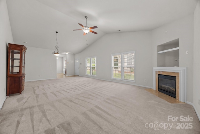 8313 Carob Tree Ln, Charlotte, NC 28215 - unfurnished living room with a ceiling fan, a fireplace, light carpet, baseboards, and high vaulted ceiling