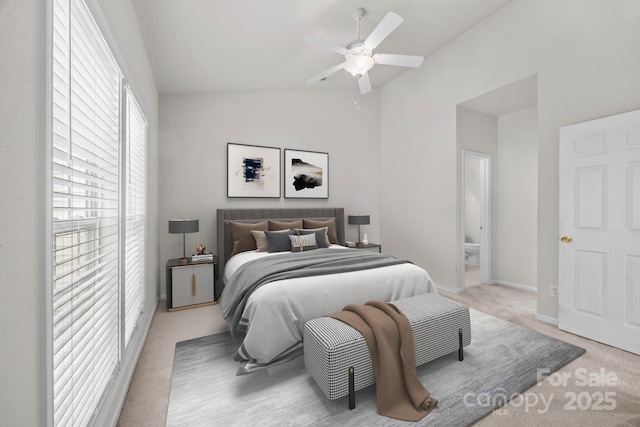 8313 Carob Tree Ln, Charlotte, NC 28215 - bedroom featuring vaulted ceiling, light colored carpet, ceiling fan, and baseboards