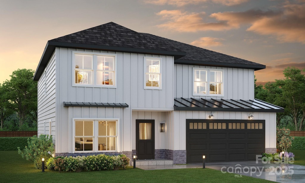 modern farmhouse with a shingled roof, metal roof, and a standing seam roof