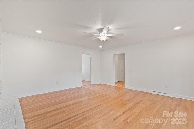 1294 Beaverdam Rd, Canton, NC 28716 - spare room featuring ceiling fan, crown molding, baseboards, a baseboard radiator, and light wood-style floors