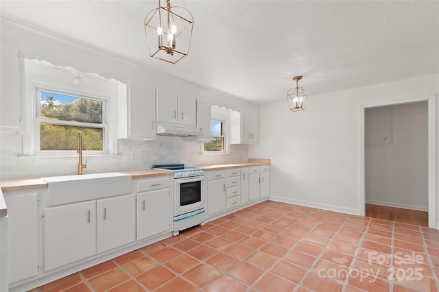 1294 Beaverdam Rd, Canton, NC 28716 - kitchen with decorative backsplash, white range with electric cooktop, a sink, an inviting chandelier, and under cabinet range hood