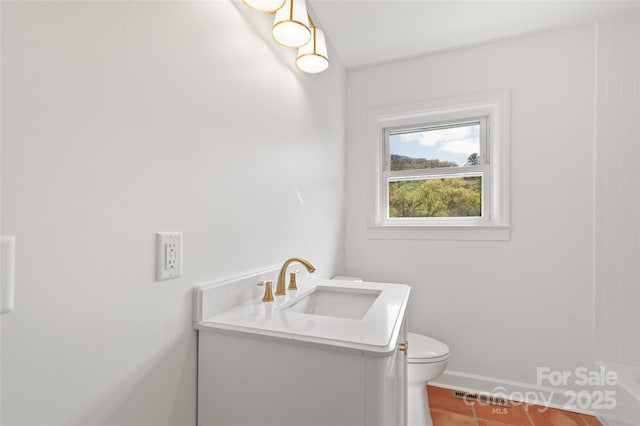 1294 Beaverdam Rd, Canton, NC 28716 - bathroom featuring vanity, toilet, baseboards, a shower, and visible vents