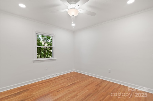 1294 Beaverdam Rd, Canton, NC 28716 - unfurnished room featuring visible vents, crown molding, baseboards, light wood-style floors, and recessed lighting