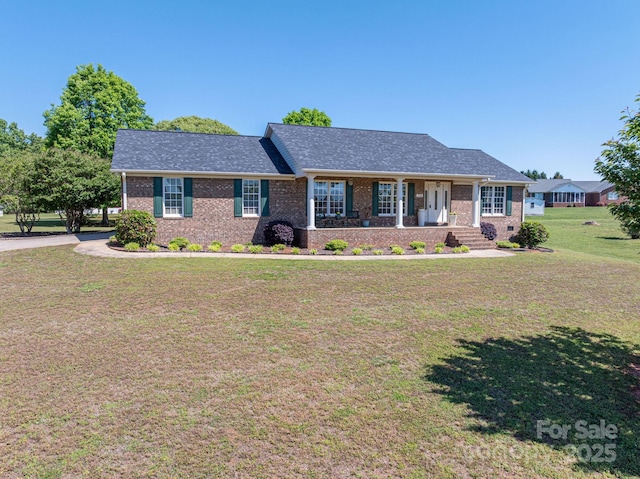 118 Sir Gregory Dr, Shelby, NC 28152 - ranch-style house with brick siding, roof with shingles, covered porch, and a front yard