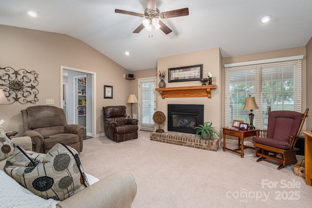 118 Sir Gregory Dr, Shelby, NC 28152 - carpeted living room featuring a brick fireplace, baseboards, recessed lighting, a ceiling fan, and vaulted ceiling