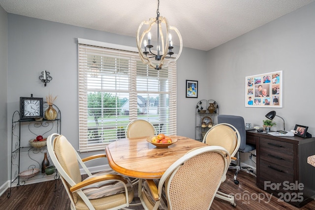 118 Sir Gregory Dr, Shelby, NC 28152 - dining area featuring baseboards, dark wood-style flooring, a textured ceiling, and a chandelier