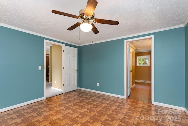 unfurnished bedroom with baseboards, a textured ceiling, and ceiling fan