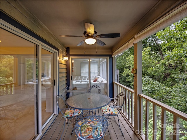 deck featuring a ceiling fan