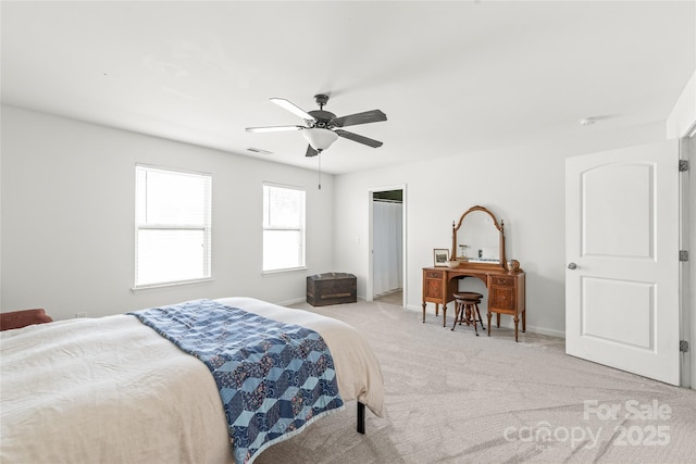 306 Fesperman Cir, Troutman, NC 28166 - bedroom with light colored carpet and a ceiling fan