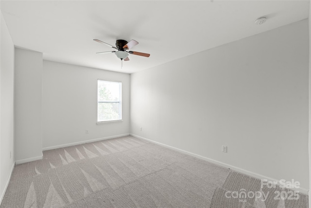 306 Fesperman Cir, Troutman, NC 28166 - unfurnished room featuring light colored carpet, ceiling fan, and a smoke detector
