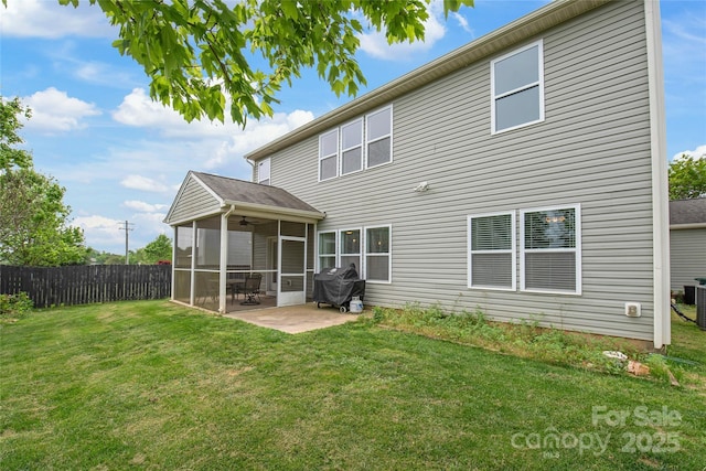 306 Fesperman Cir, Troutman, NC 28166 - back of house featuring a sunroom, a patio area, and a ceiling fan