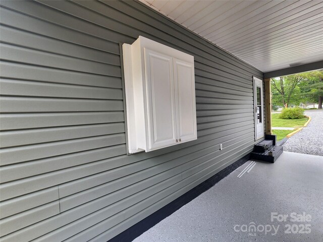 501 N Hawthorne St, Mount Holly, NC 28120 - view of home's exterior featuring covered porch