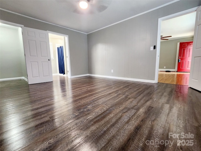 501 N Hawthorne St, Mount Holly, NC 28120 - spare room with ornamental molding, ceiling fan, wood finished floors, and baseboards