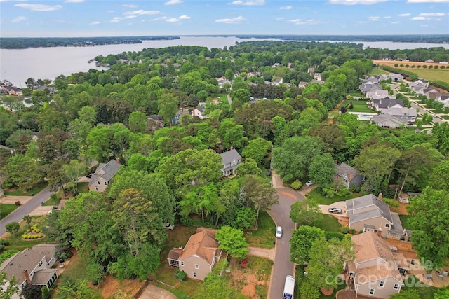 bird's eye view with a water view and a residential view