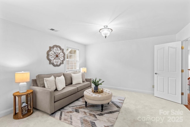 carpeted living room with baseboards and visible vents