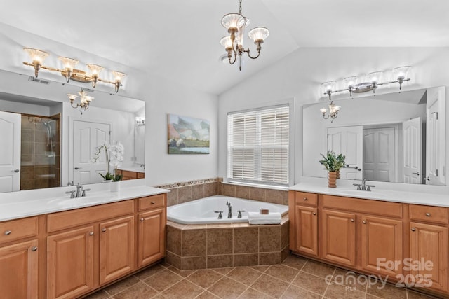 full bath featuring a sink, tile patterned flooring, visible vents, and a notable chandelier