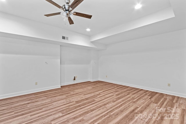 spare room with recessed lighting, baseboards, visible vents, and light wood-type flooring