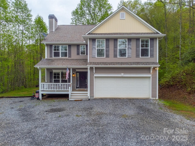 view of front of property with a porch, driveway, a chimney, a garage, and a shingled roof