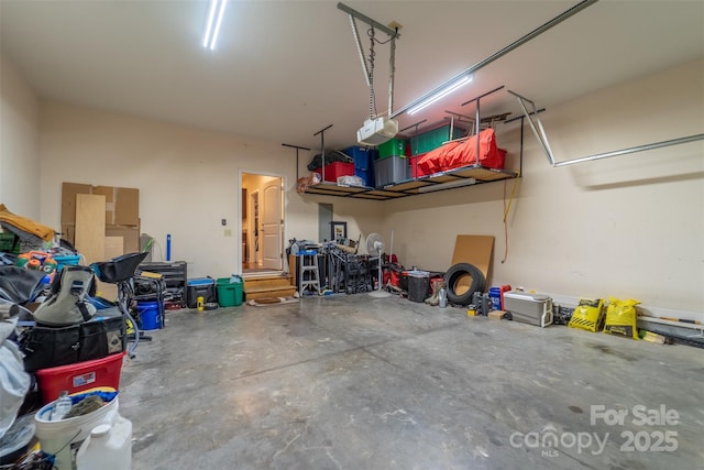 garage featuring a garage door opener
