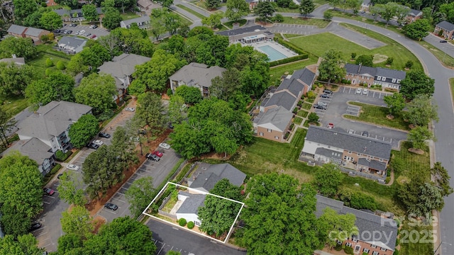 aerial view of property's location with nearby suburban area and property boundaries highlighted