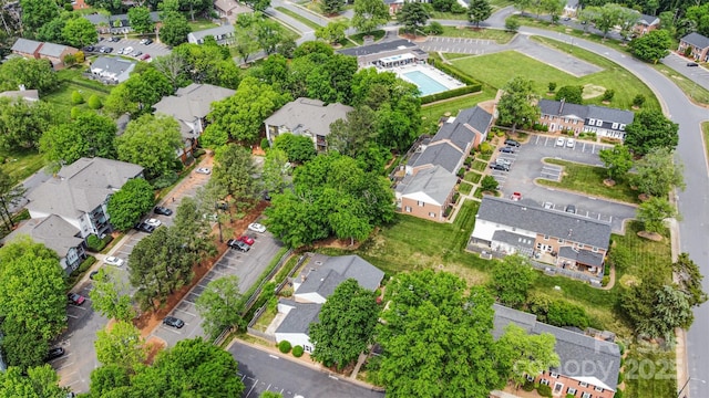 aerial view of property's location featuring nearby suburban area