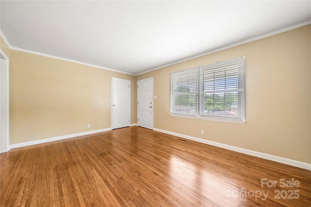 115 K M Murphy Rd, Gastonia, NC 28056 - unfurnished room featuring ornamental molding, wood finished floors, and baseboards
