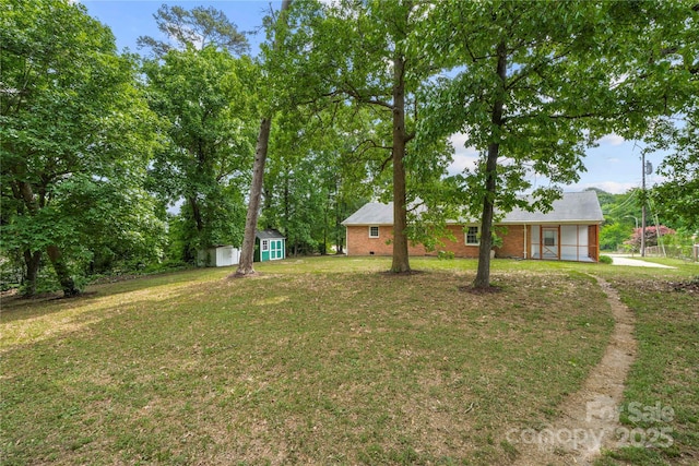 115 K M Murphy Rd, Gastonia, NC 28056 - view of yard with an outbuilding and a storage shed