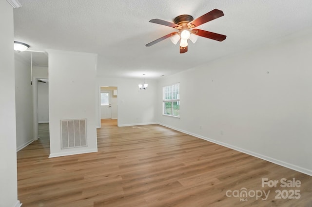 519 Jacobs Rdg, Fort Mill, SC 29715 - spare room with light wood-type flooring, ceiling fan, baseboards, and a textured ceiling