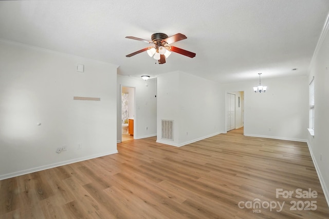 519 Jacobs Rdg, Fort Mill, SC 29715 - unfurnished living room with a ceiling fan, a chandelier, light wood-style floors, and baseboards