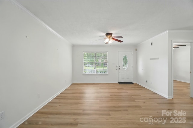 519 Jacobs Rdg, Fort Mill, SC 29715 - entryway with a ceiling fan, ornamental molding, baseboards, and light wood-style flooring