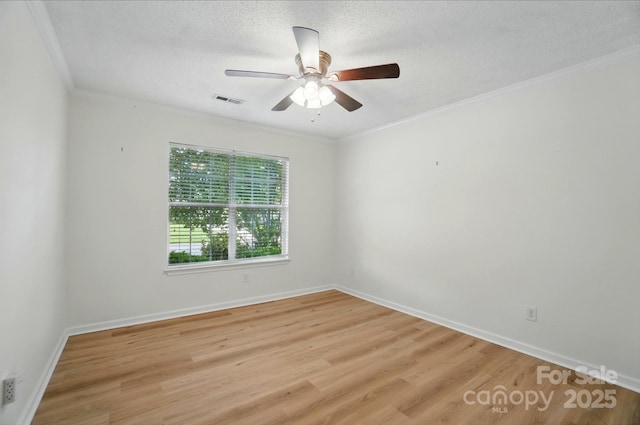 519 Jacobs Rdg, Fort Mill, SC 29715 - spare room with light wood finished floors, a ceiling fan, ornamental molding, and baseboards