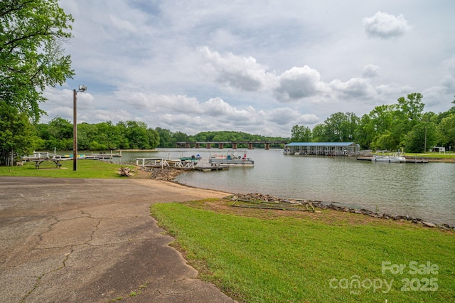 property view of water featuring a dock