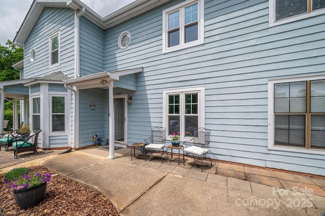 rear view of property with a patio area