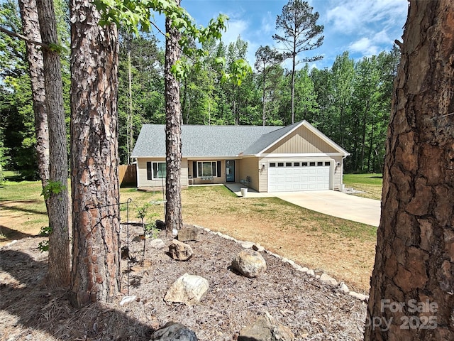 ranch-style house featuring a front lawn, driveway, an attached garage, a shingled roof, and board and batten siding