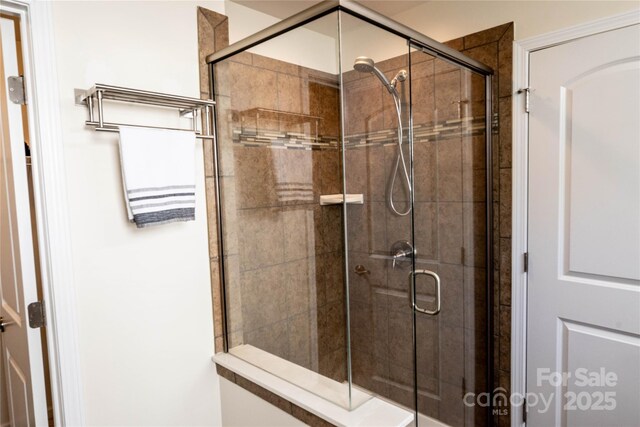 full bathroom with a shower stall
