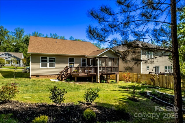 rear view of house with crawl space, a lawn, stairs, a deck, and fence