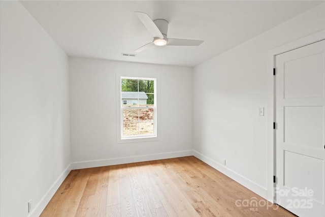 2429/2425 Ellen Ave, Charlotte, NC 28208 - empty room featuring a ceiling fan, baseboards, visible vents, and light wood finished floors