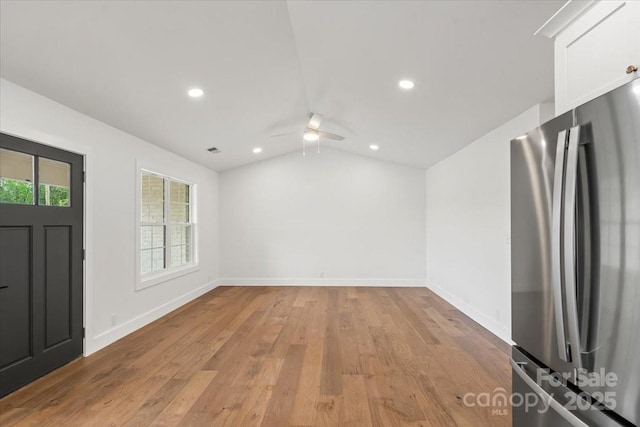 2429/2425 Ellen Ave, Charlotte, NC 28208 - interior space featuring lofted ceiling, baseboards, light wood-style floors, and ceiling fan