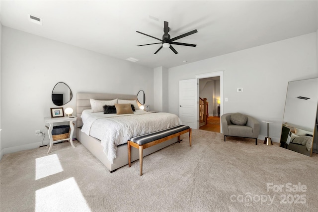 bedroom featuring baseboards, a ceiling fan, carpet flooring, and visible vents