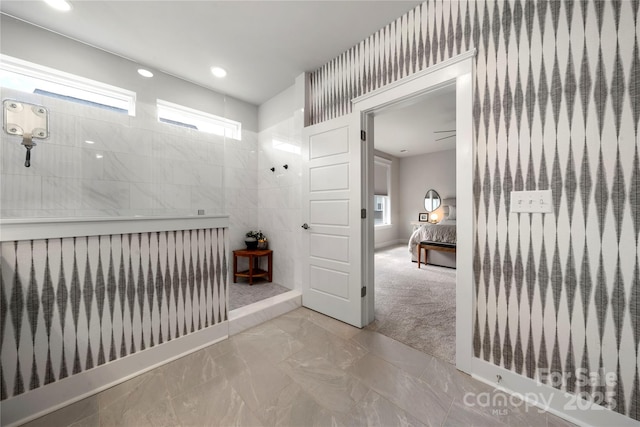 hallway with carpet, recessed lighting, and a wealth of natural light